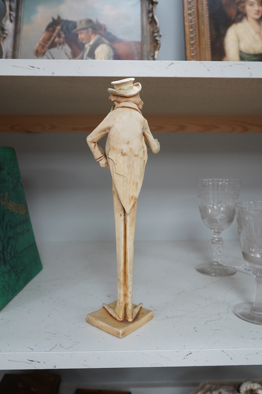 A 19th century Amphora novelty figure, 34cm. Condition - poor